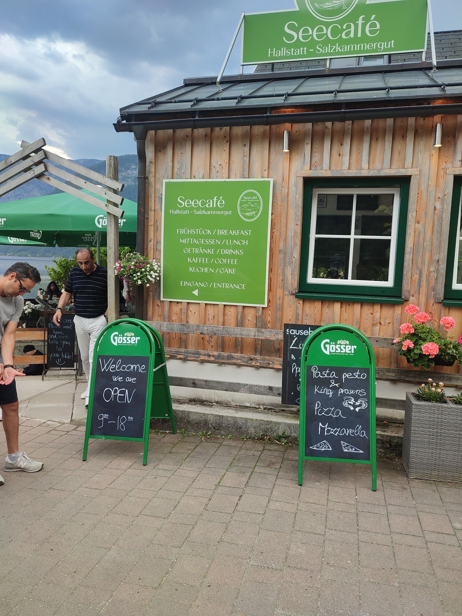 Seecafé Hallstatt entrance with breakfast, lunch, drinks, coffee and cake signage